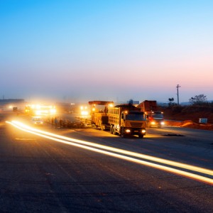 Workers on a road construction, industry and teamwork